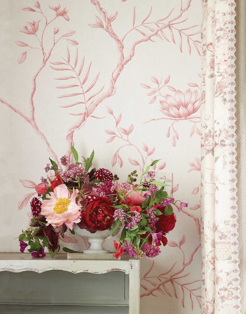red and pink flower arrangement; pink floral wallpaper