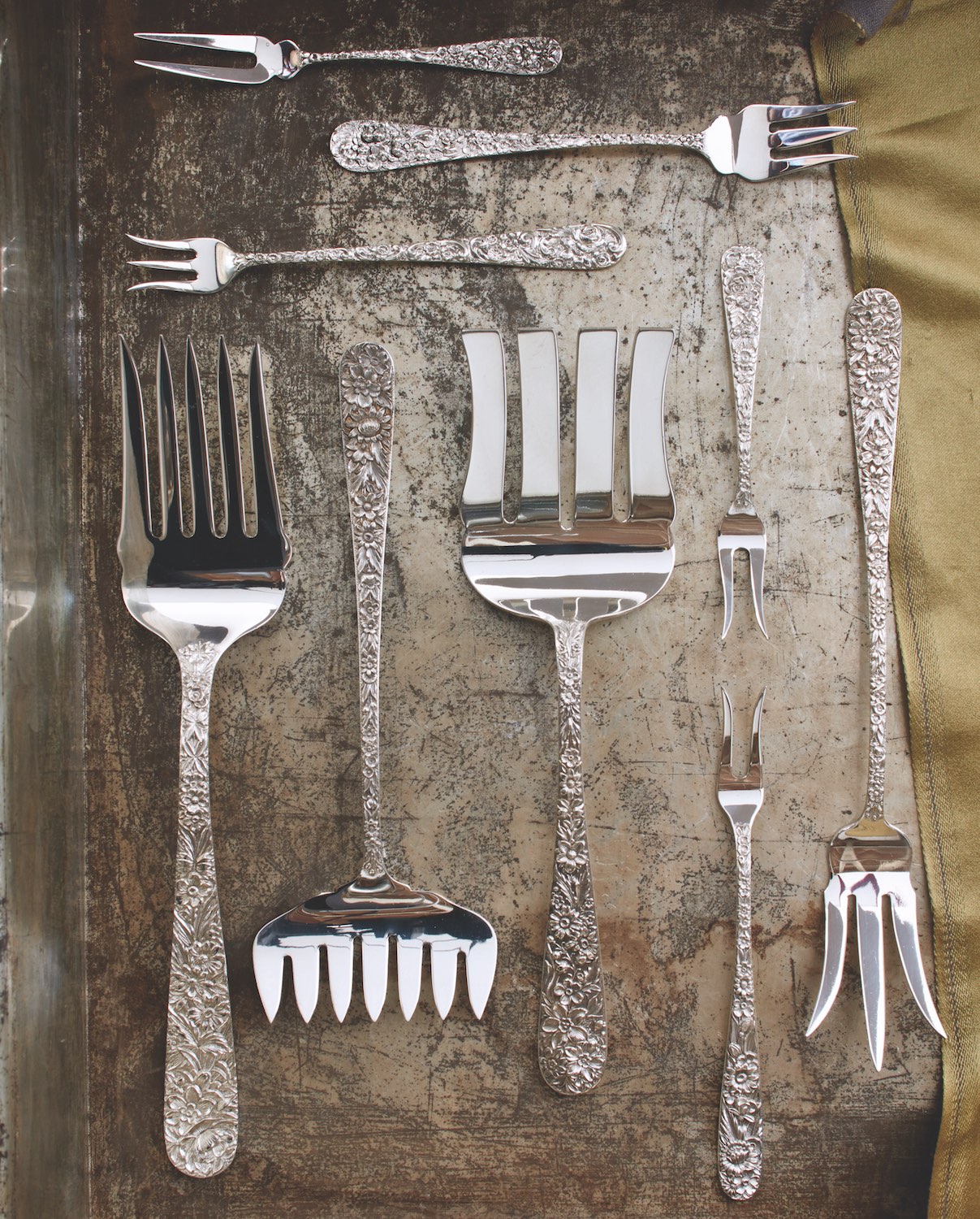 Victorian silver repousse: Berry, pickle, and oyster forks. Cold meat, bacon, asparagus, large and medium lemon, and lettuce forks