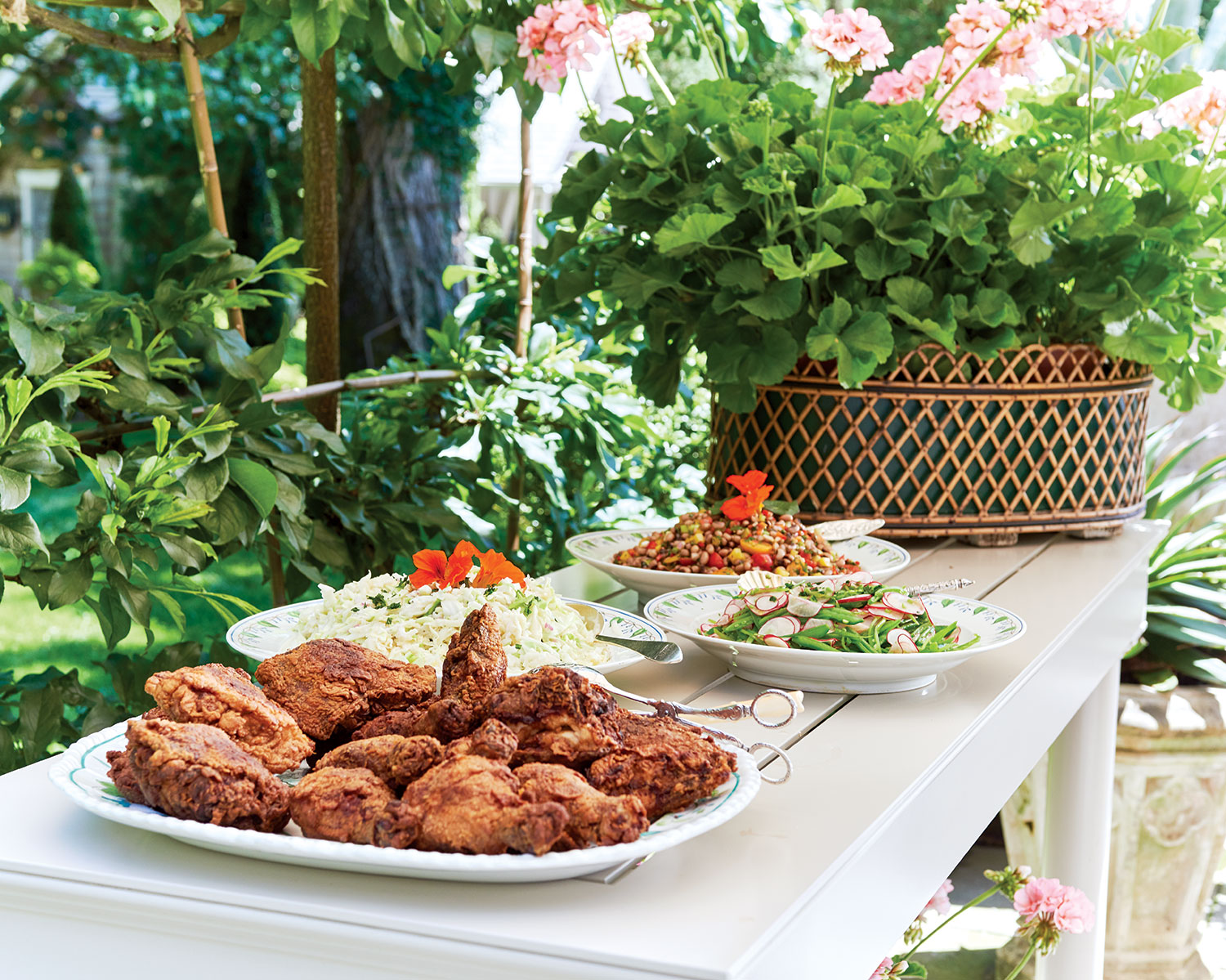 A buffet of fried chicken and other classic southern dishes awaits guests.