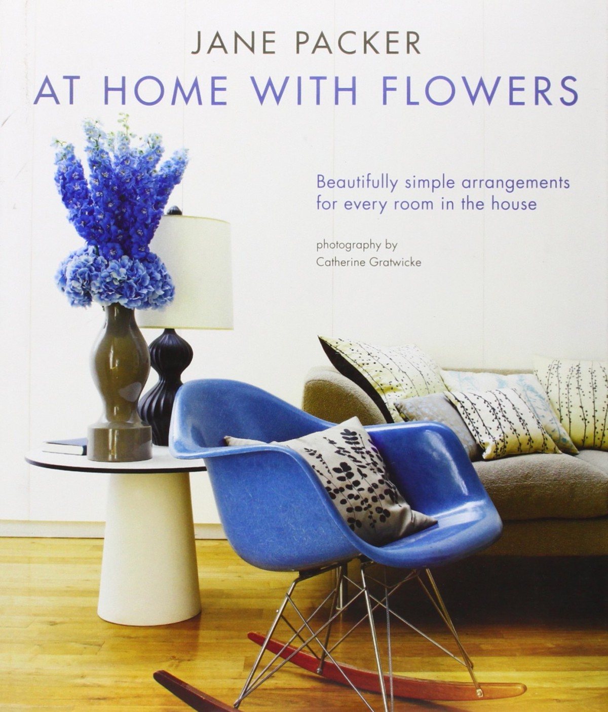 Blue accents on the cover of AT HOME WITH FLOWERS.
