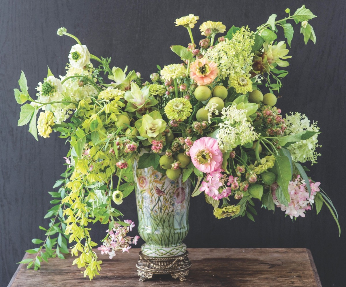 Old world flower arrangement in pink and green, with limelight hydrangeas.