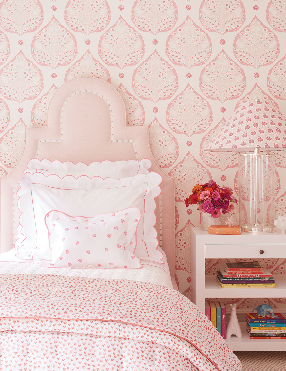 Pink on pink girl's bedroom designed by Ashley Whittaker.