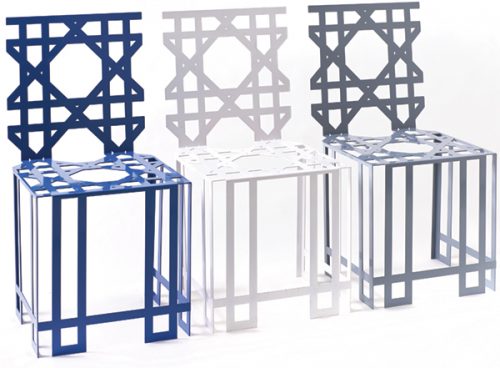 three chairs, each a different color - blue, white and gray