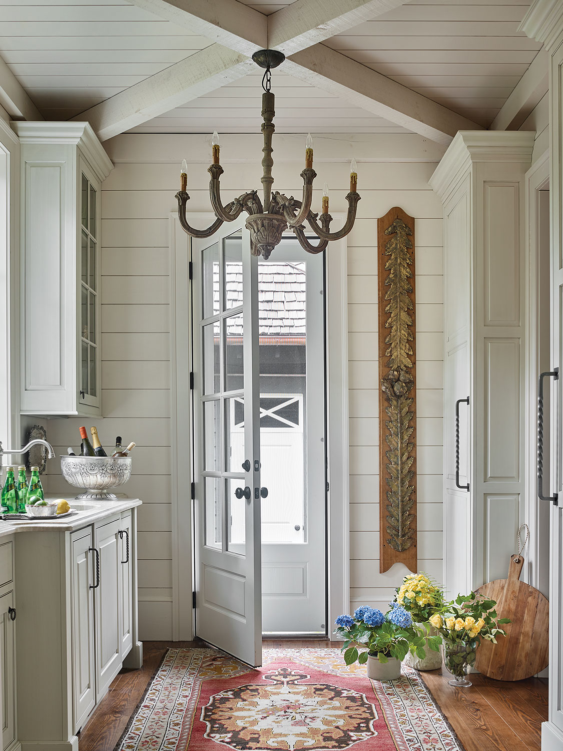 The elegant working pantry. The door leads to a detached two-car garage.