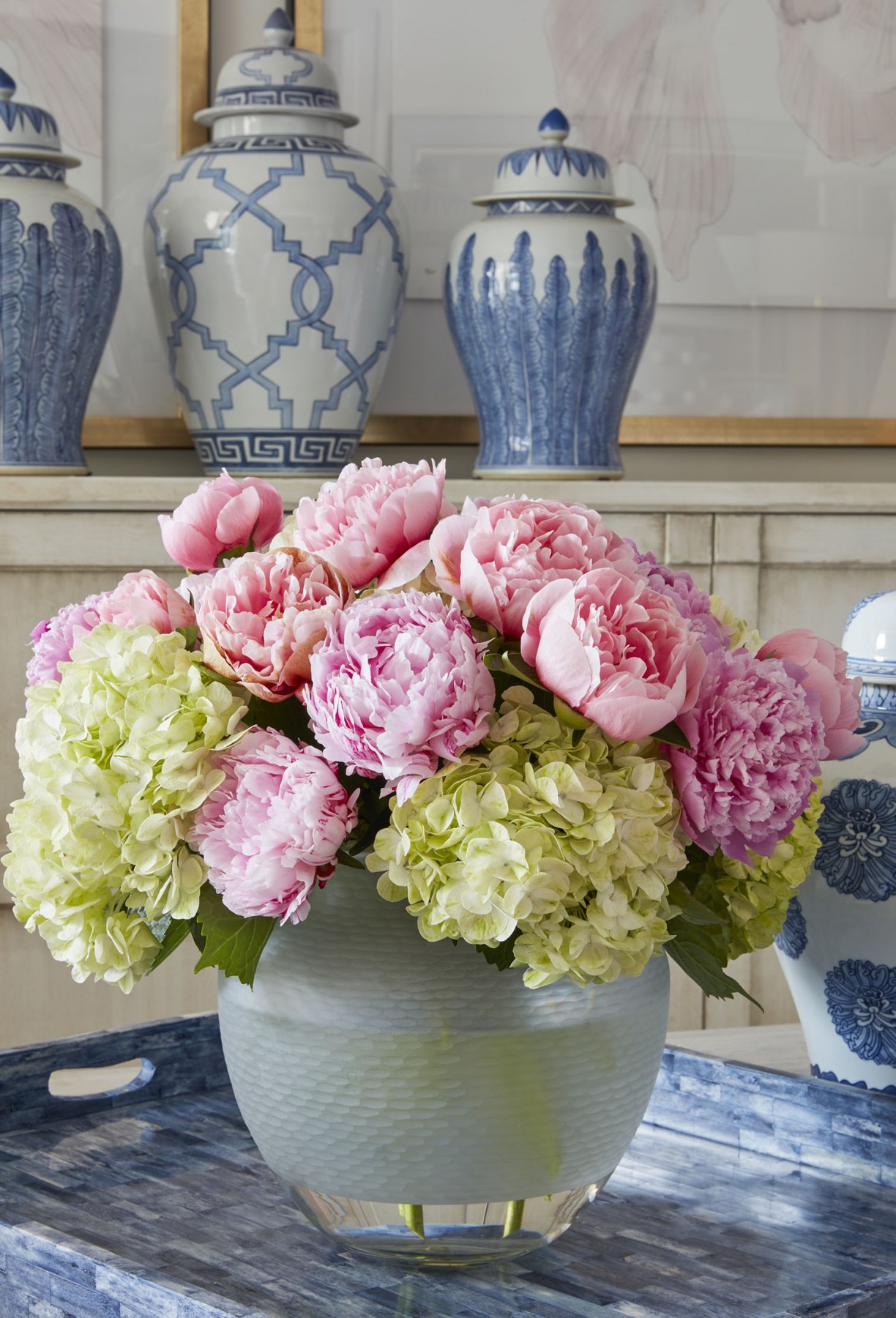 Renny & Reed created this arrangement of pink peonies and lime hydrangeas