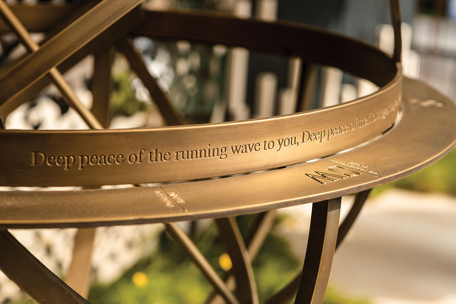 The inscription reads "Deep peace of the running wave to you."