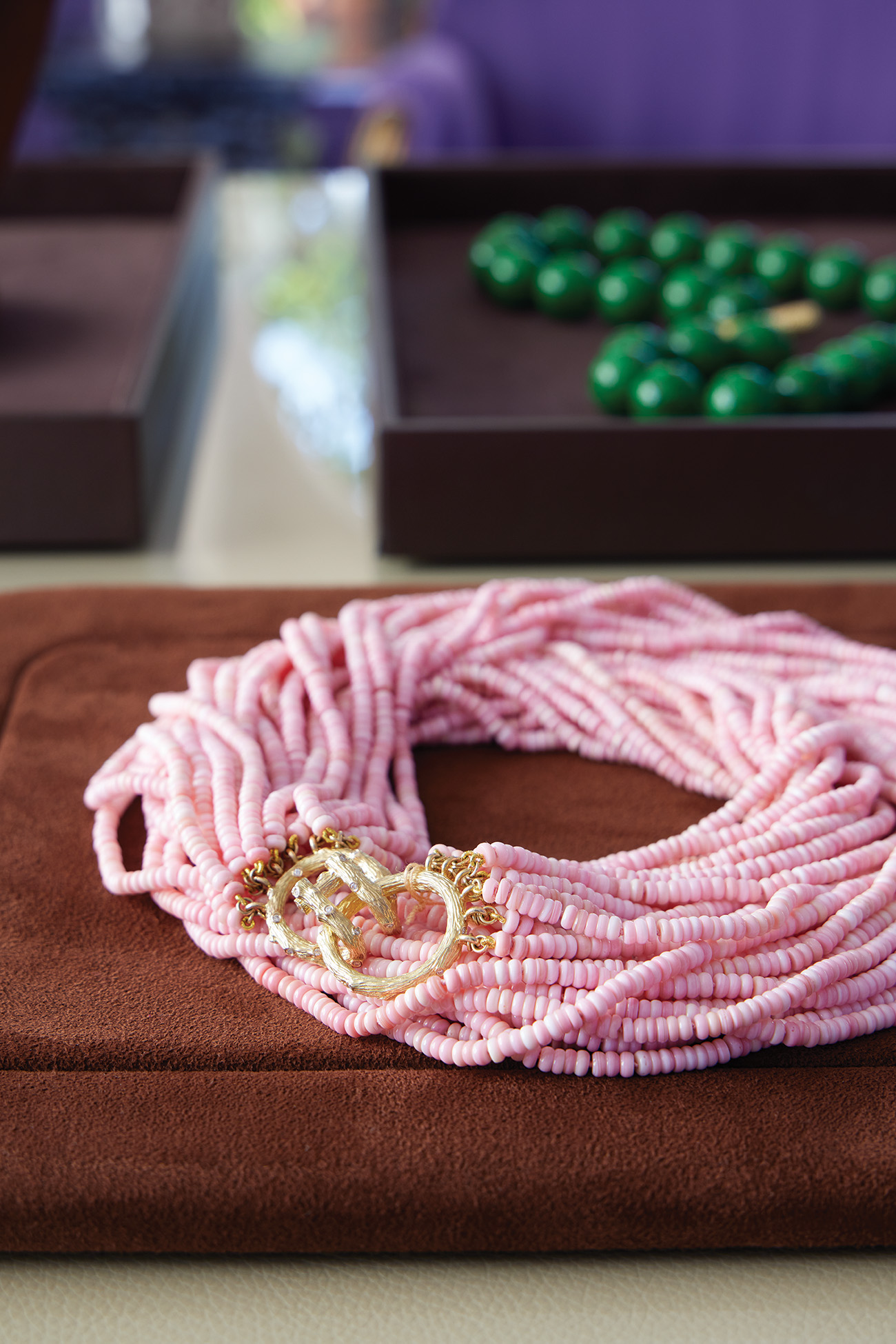 Pink morganite necklace and a lustrous strand of Burmese, apple green maw sit sit beads.
