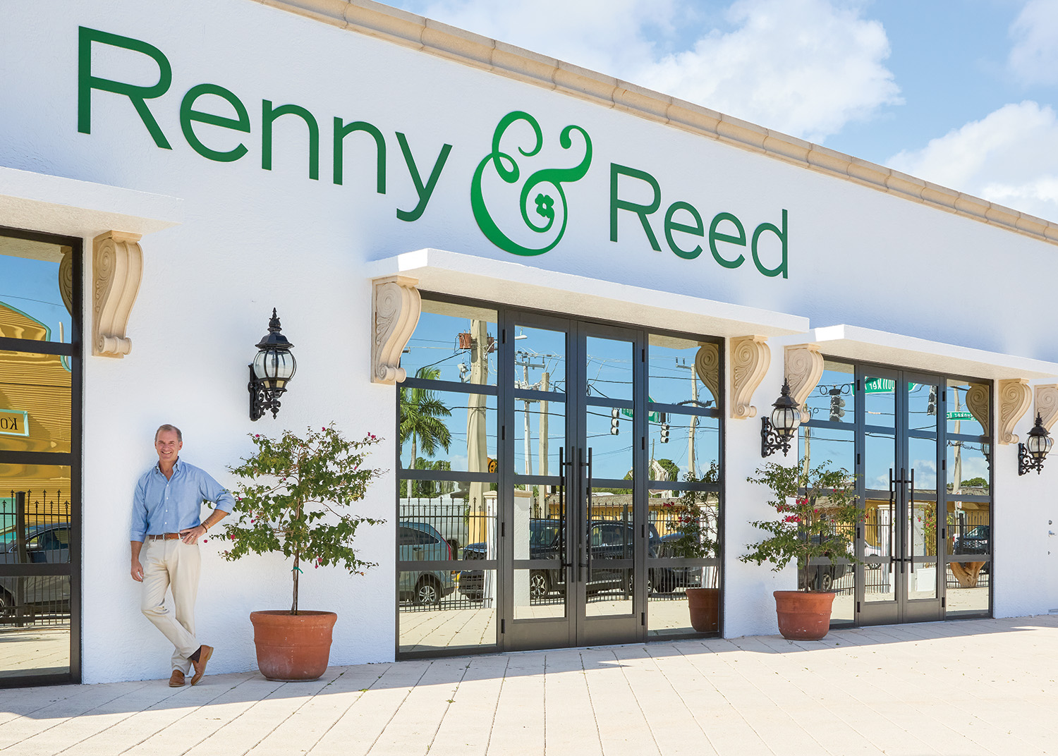Reed McIlvaine standing outside Renny & Reed's Palm Beach staging and production facility.