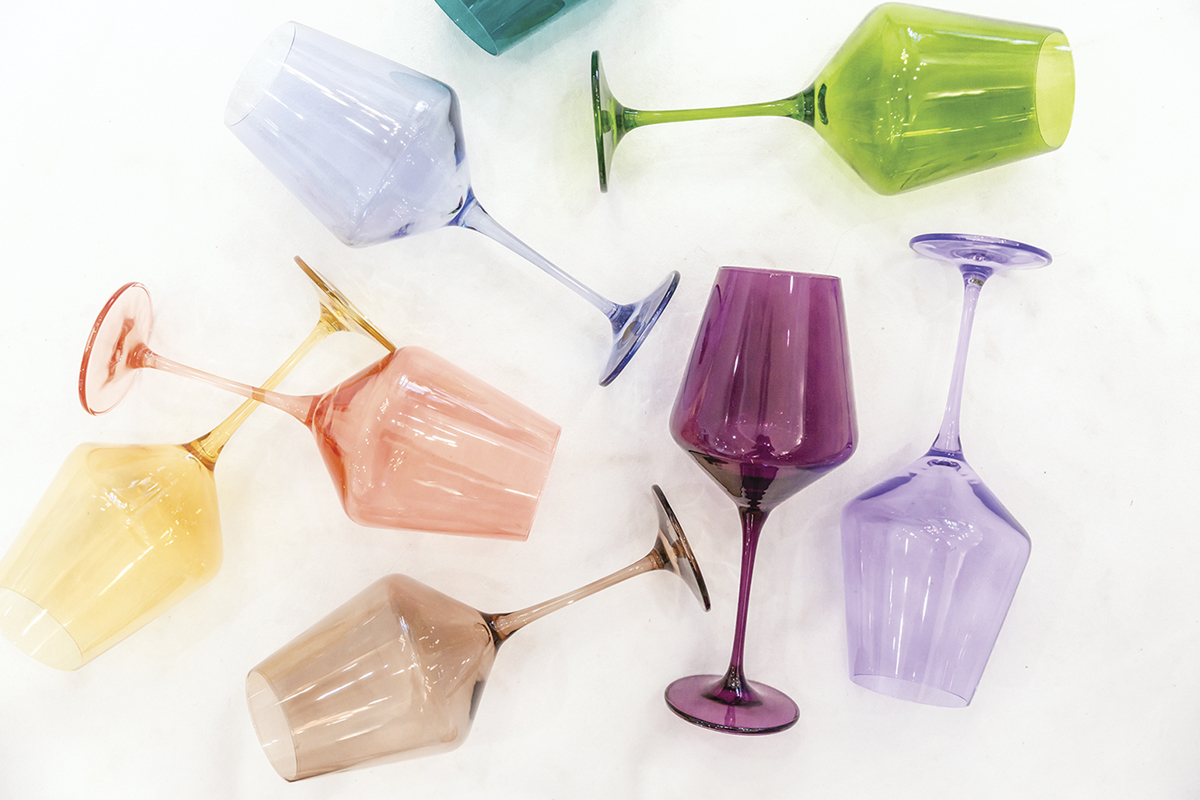 handblown wine glasses in purple, blue, green, peach, brown and yellow from Estelle Colored Glass
