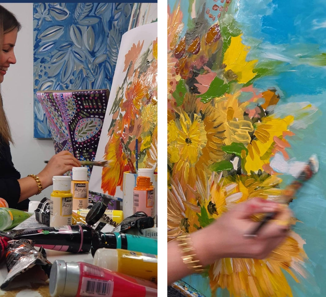 Artist Jan Erika at work on a floral painting based on a design by The Flower Hat