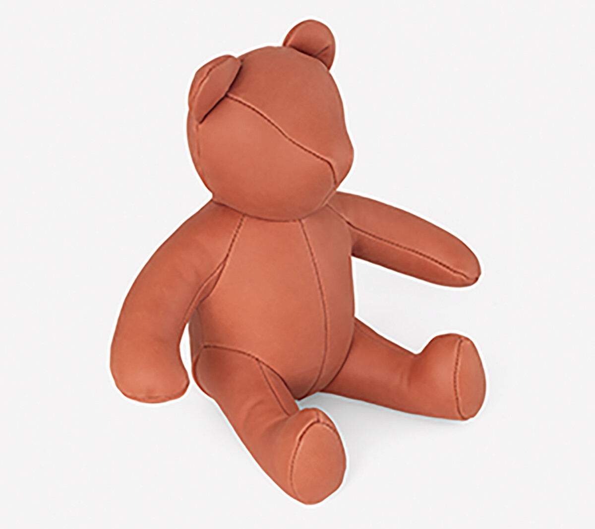 Colorful Home Decor and Accessories for 2021: color orange. Orange leather stuffed toy bear