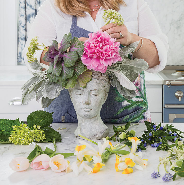 Step 4, Martha Whitney Butler of The French Potager demonstrates adding focal flowers
