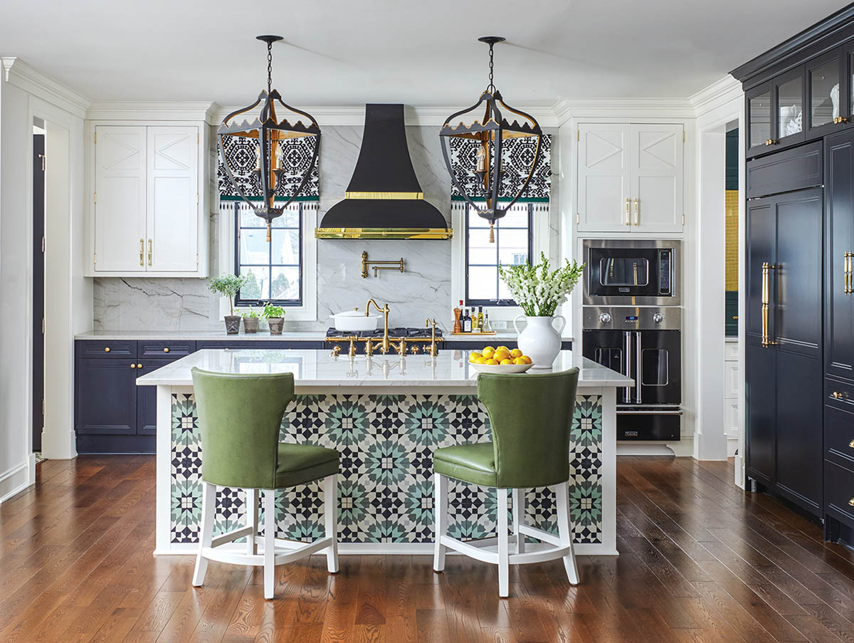 kitchen with navy cabinets and white, green, and aqua accents by interior designer Corey Damen Jenkins