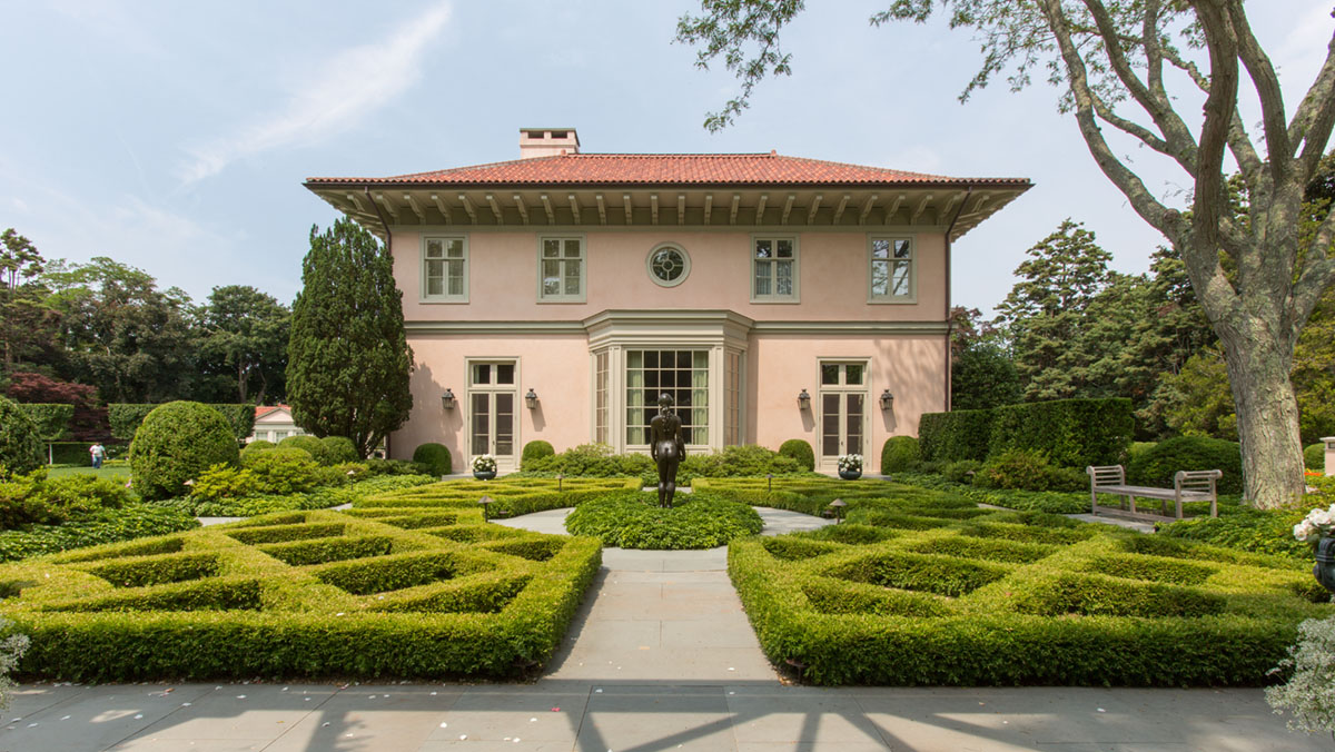 formal front landscape for a Spanish Revival style home