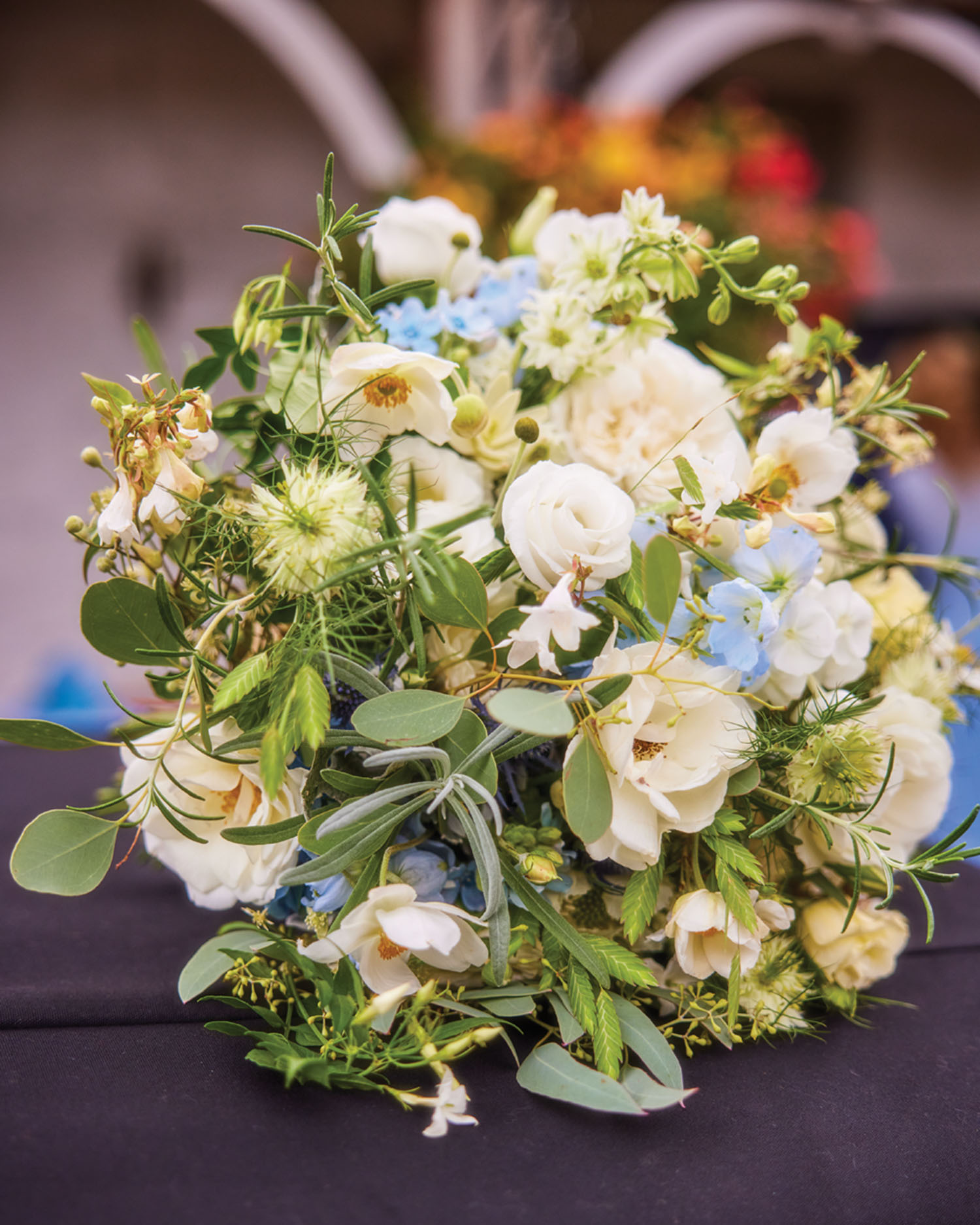 India’s wedding bouquet, created by Pulbrook & Gould, included roses (‘Iceberg,’ ‘Winchester Cathedral,’ and ‘Susan’), phlox, Japanese anemones, rosemary, lavender foliage, tuberose, hydrangeas, lisianthus, love-in-a-mist, eucalyptus, abelia, and clematis.