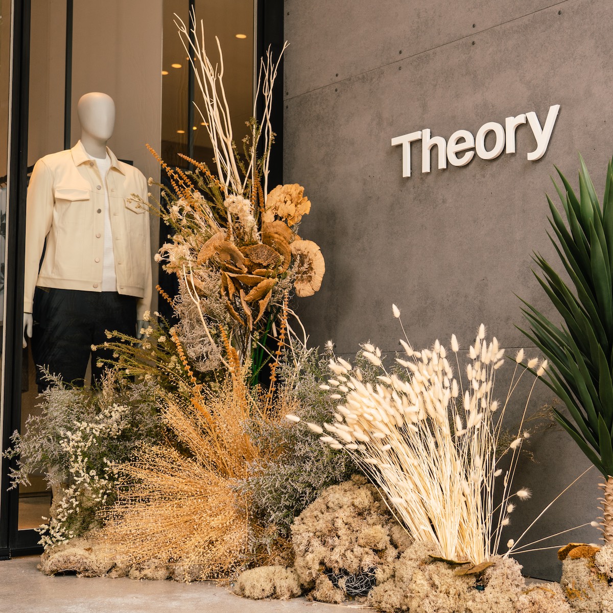 Installation of dried flowers and grasses at Theory in Buckhead Village, at the Bodacious Blooms festival