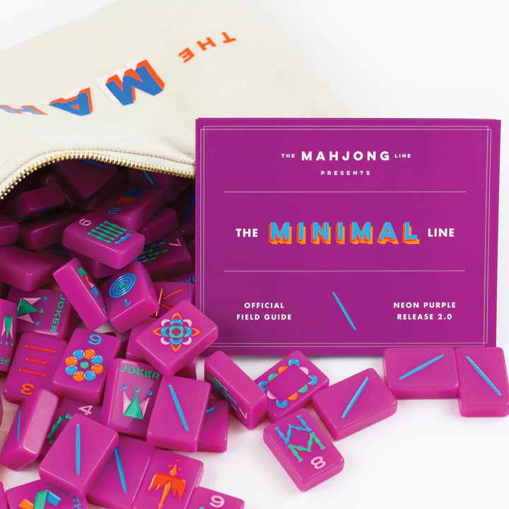 The Majong Line's Neon Purple Release 2.0 bold, purple majong tiles and box