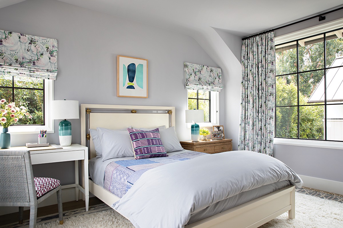 Curtains in Alex Mason's Victorian Mod design punch up the drama in a feminine bedroom designed by the LA firm Lucas Studio.