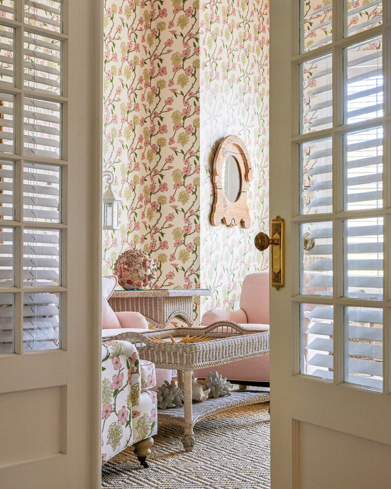 When refreshing the décor at Florida’s historic Gasparilla Inn, Kemble Interiors swathed a room in Ferrick Mason’s Lexington wallpaper in Pink Oyster.