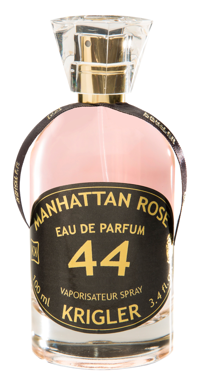 Manhattan Rose perfume in pink glass bottle.