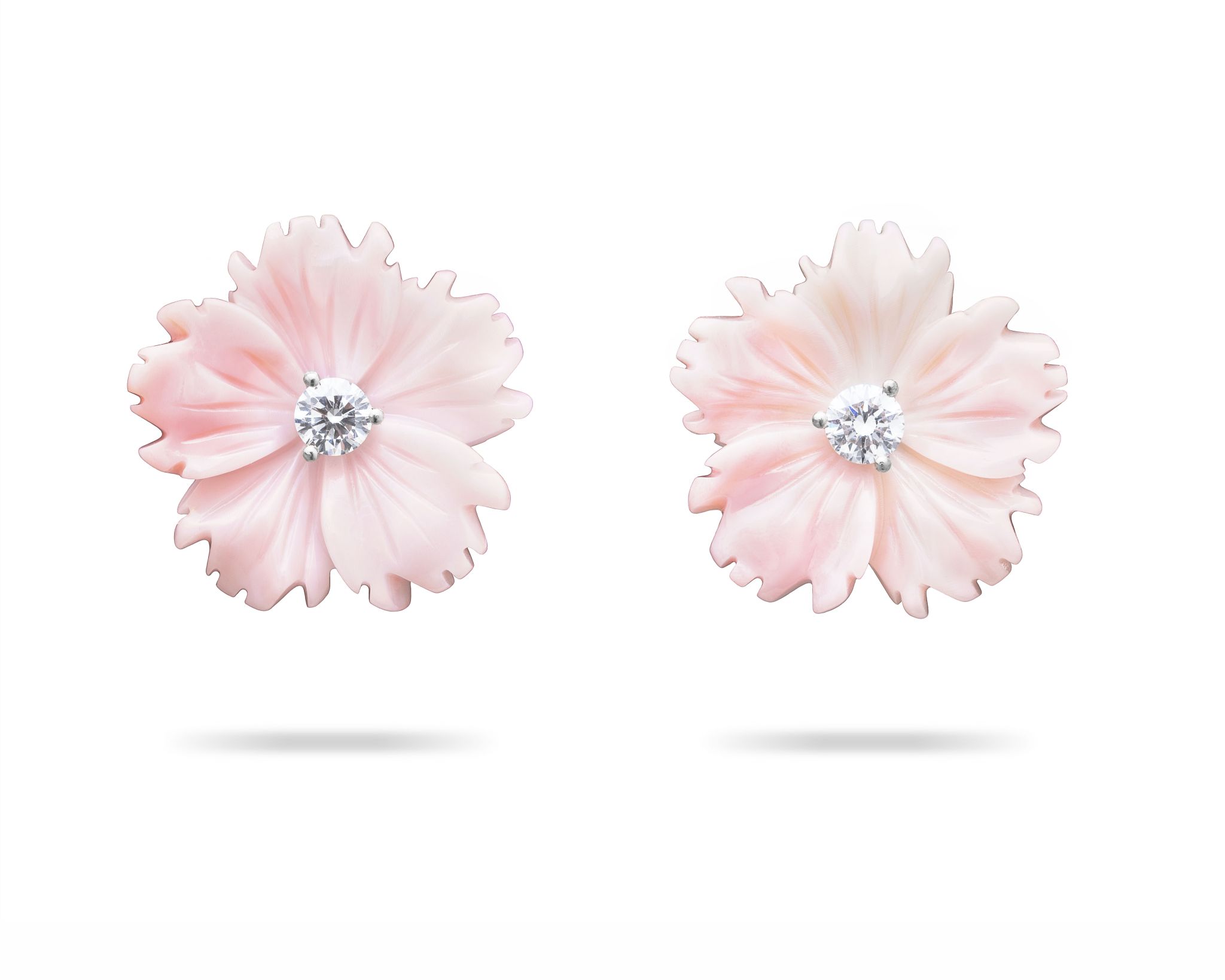 Two pink floral stud earrings.