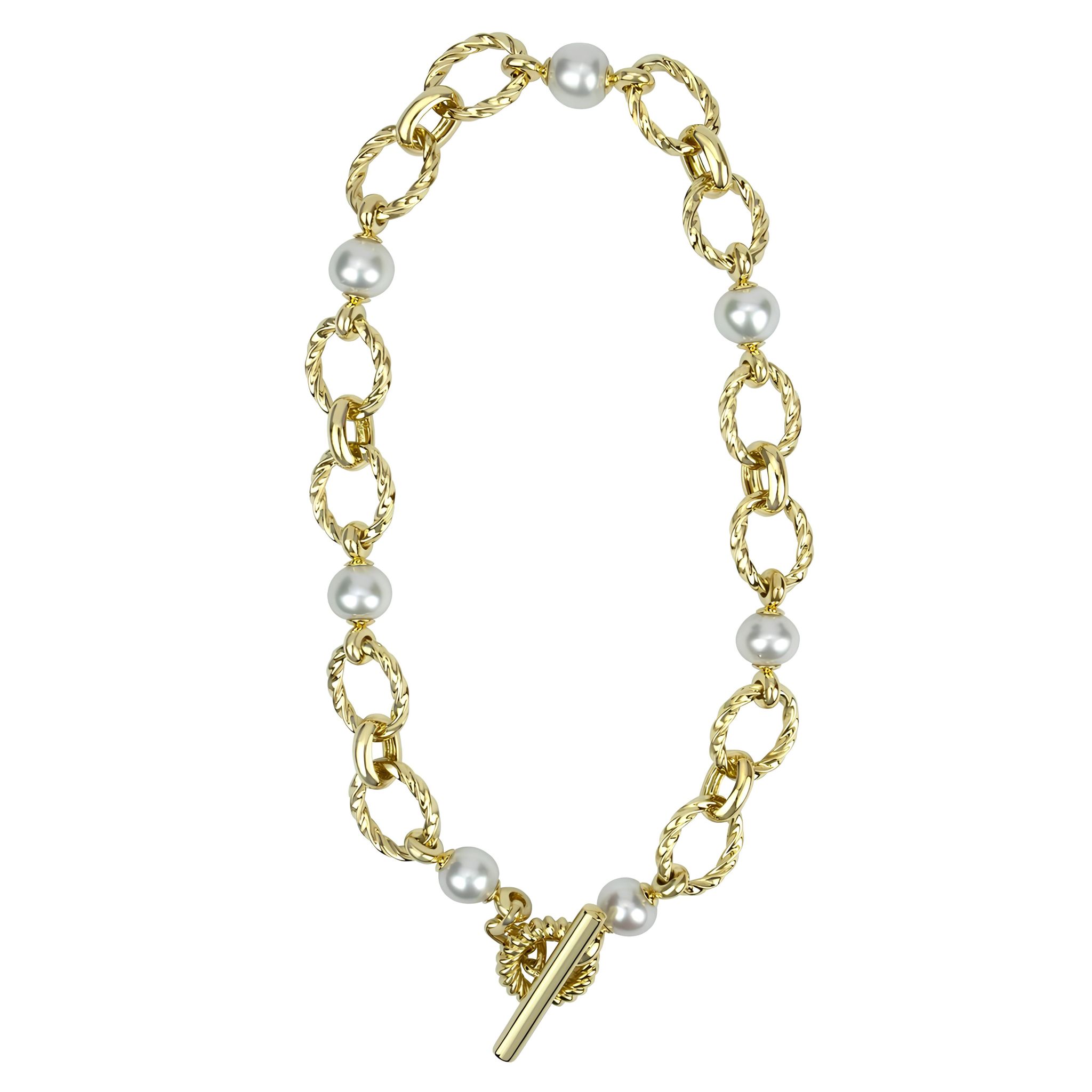 A gold necklace with pearls.