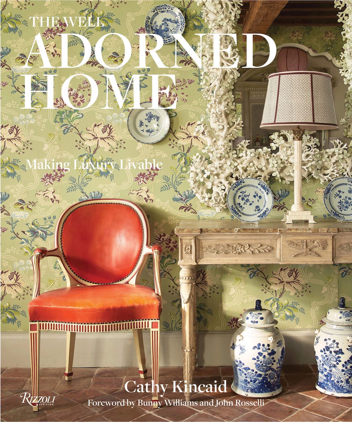Cover of Well Adorned Home with orange chair and chinoiserie ginger jars.