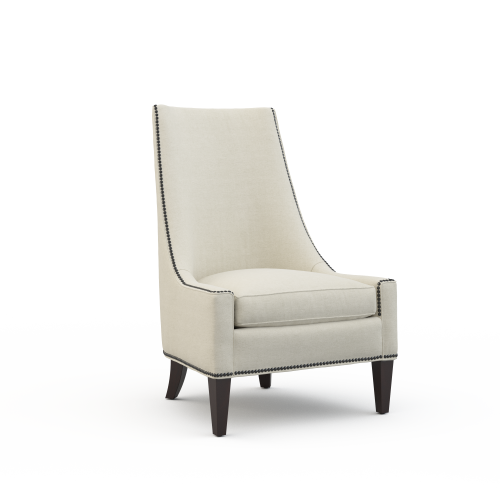 A white chair with a high upholstered back.