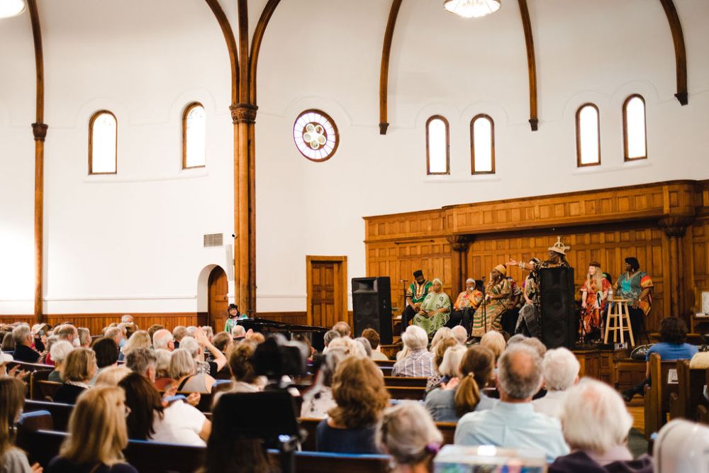 Singers sing at the circular congregational church.