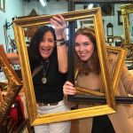 Ann Connelly and Chelsea Norris shopping for frames in Florence, Italy